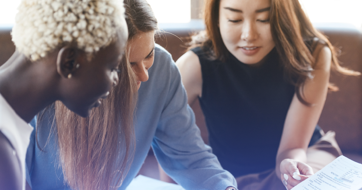 Project management tips in Trello - an image of three women working at a desk.